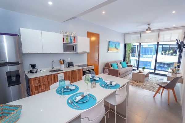property management; Menesse the City is one of the most centrally located buildings for vacation rentalsinPlaya del Carmen. It isclose to 5th Avenue, restaurants and largesupermarkets, makingit ideal for visitors.